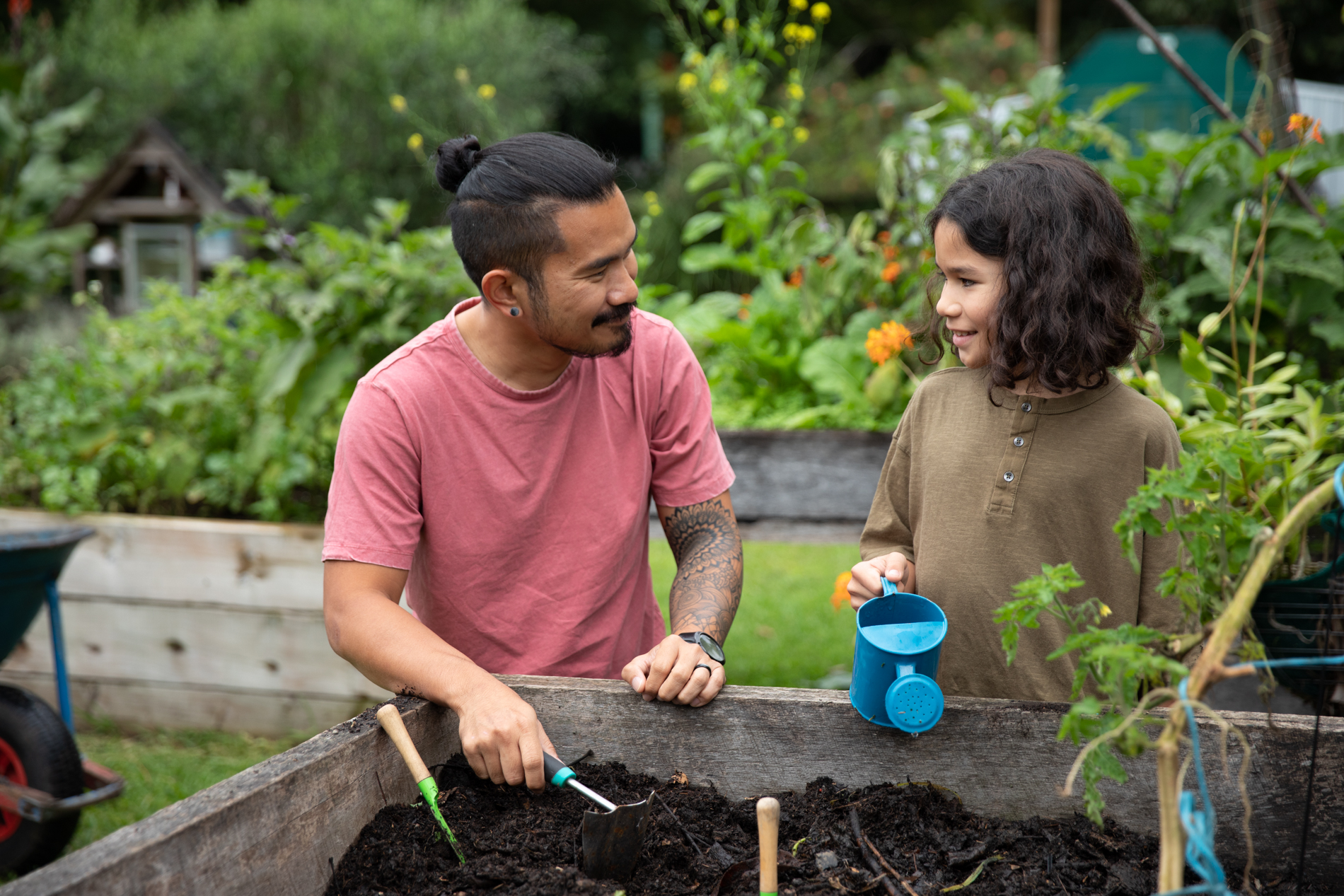 Man and boy gardening